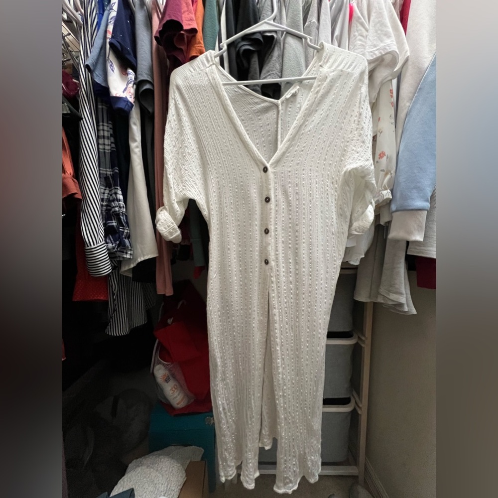En Crème button down swim cover up with silver stripe detailing.